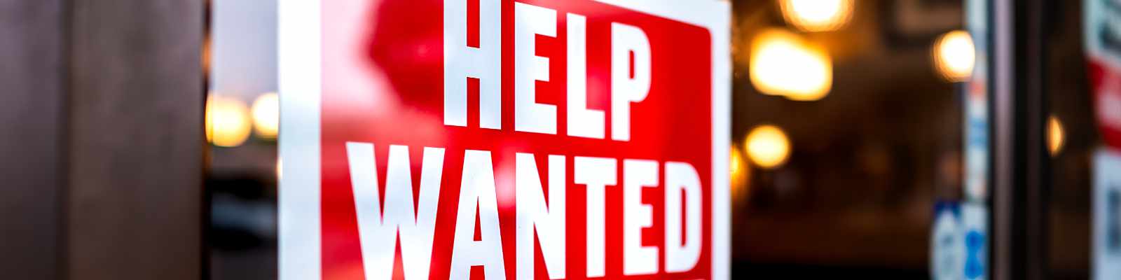 Putting out a help wanted sign to attract a strategic planning consultant.